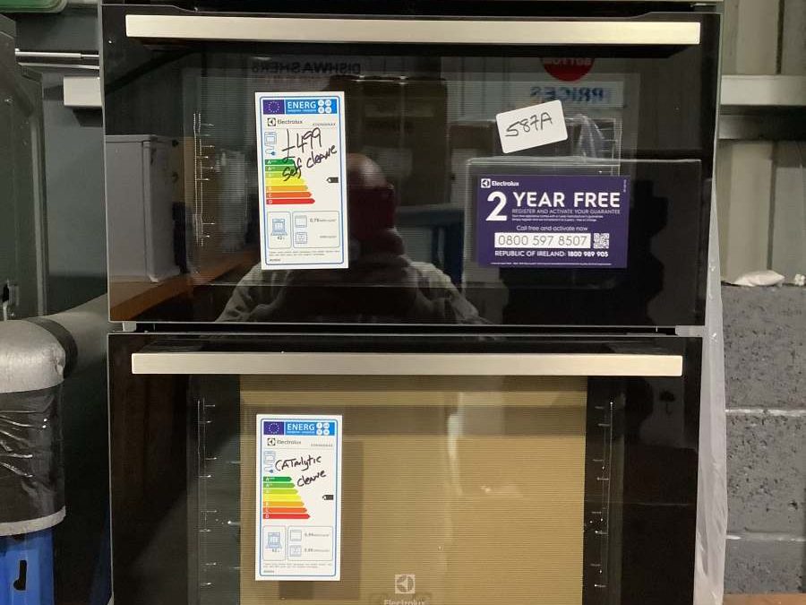 Display oven with promo stickers in appliance store